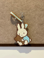 Cookie Bunny Pixel Charm – Seated White Rabbit with Biscuit & Checkered Heart – Sweet Pastel Decor