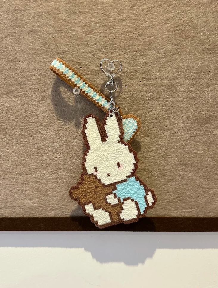 Cookie Bunny Pixel Charm – Seated White Rabbit with Biscuit & Checkered Heart – Sweet Pastel Decor