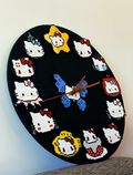 Hello Kitty Pixel Clock – 12 Unique Kitty Designs with Butterfly Centre – Pink DIY Wall Clock