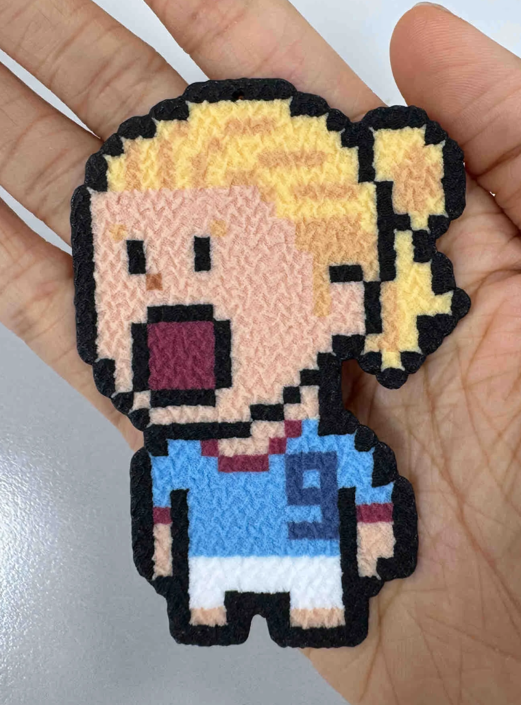 Erling Haaland Pixel Charm – Q‑Style Footballer with #9 Sky Blue Kit – Celebratory Expression