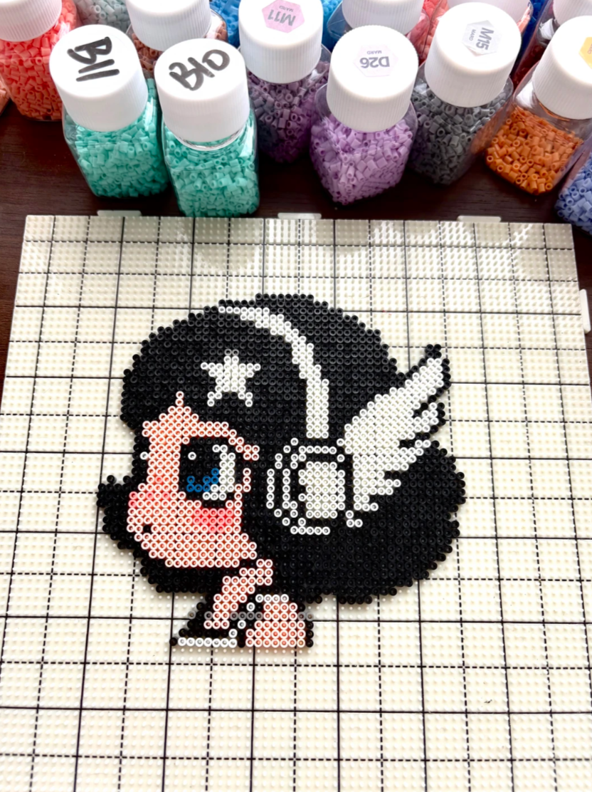 Y2K Dark Sweet Pixel Girl – Black Curly Hair, Blue Eyes & Wing Headdress – Edgy Kawaii Decor